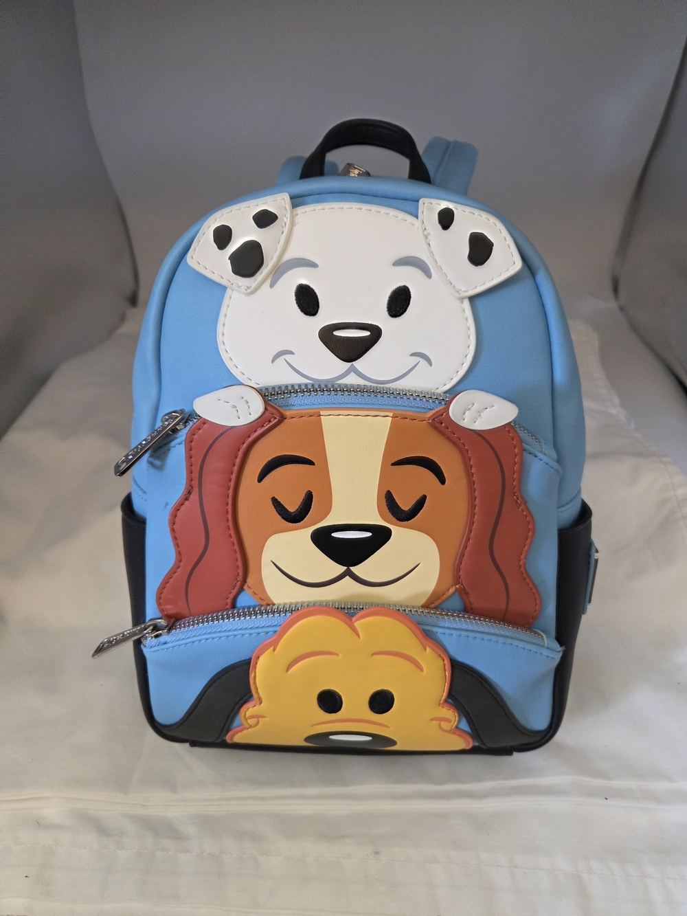 Loungefly Disney Parks Mini Backpack Festuring Rolly, Lady & Pluto